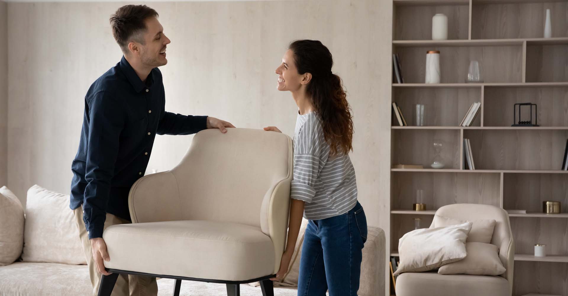 A couple moving their items