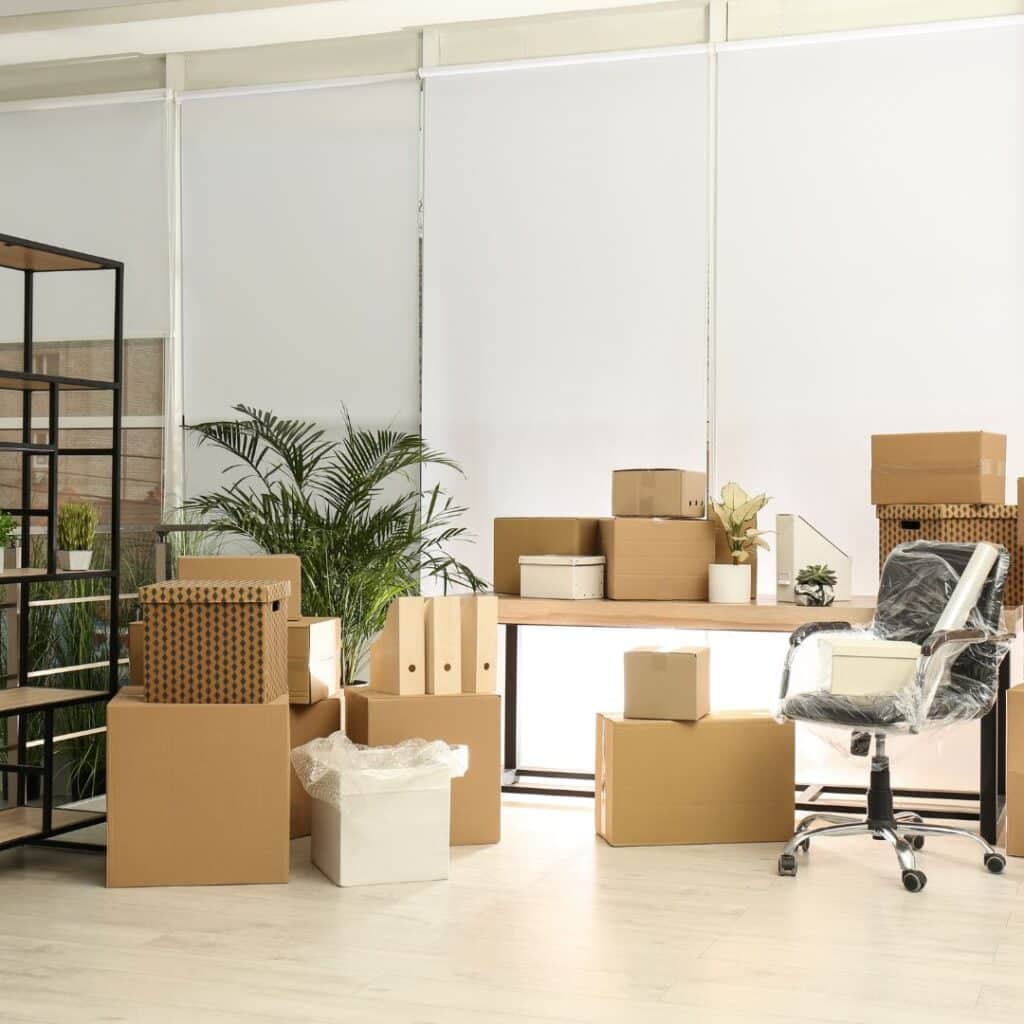 office full of moving boxes