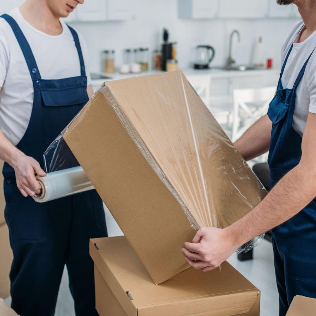 carefully wrapping a box