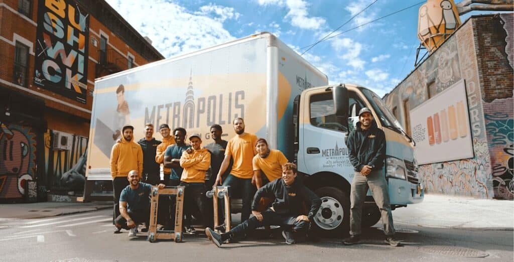 A team of professional movers handling boxes in Denver