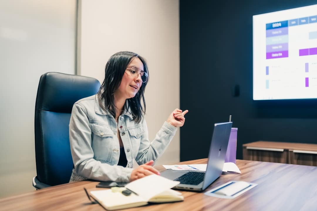 A diverse business team collaborating around a desk, signifying planning and strategy.