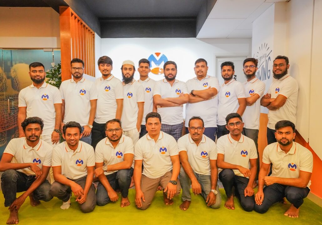 Professional commercial movers loading a truck